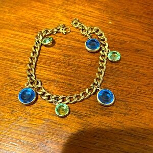 Gold tone Monet green and blue bracelet.
